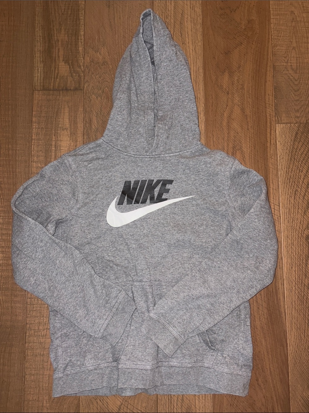 Nike Gray Pullover Hoodie with White Swoosh and Black Logo